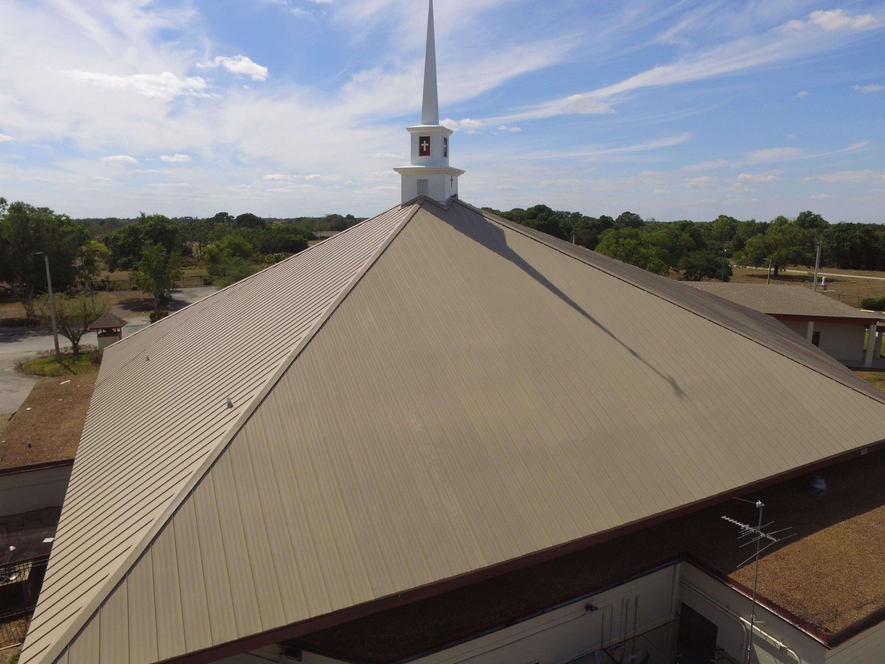 Completed metal roof replacement on a church building in Orlando